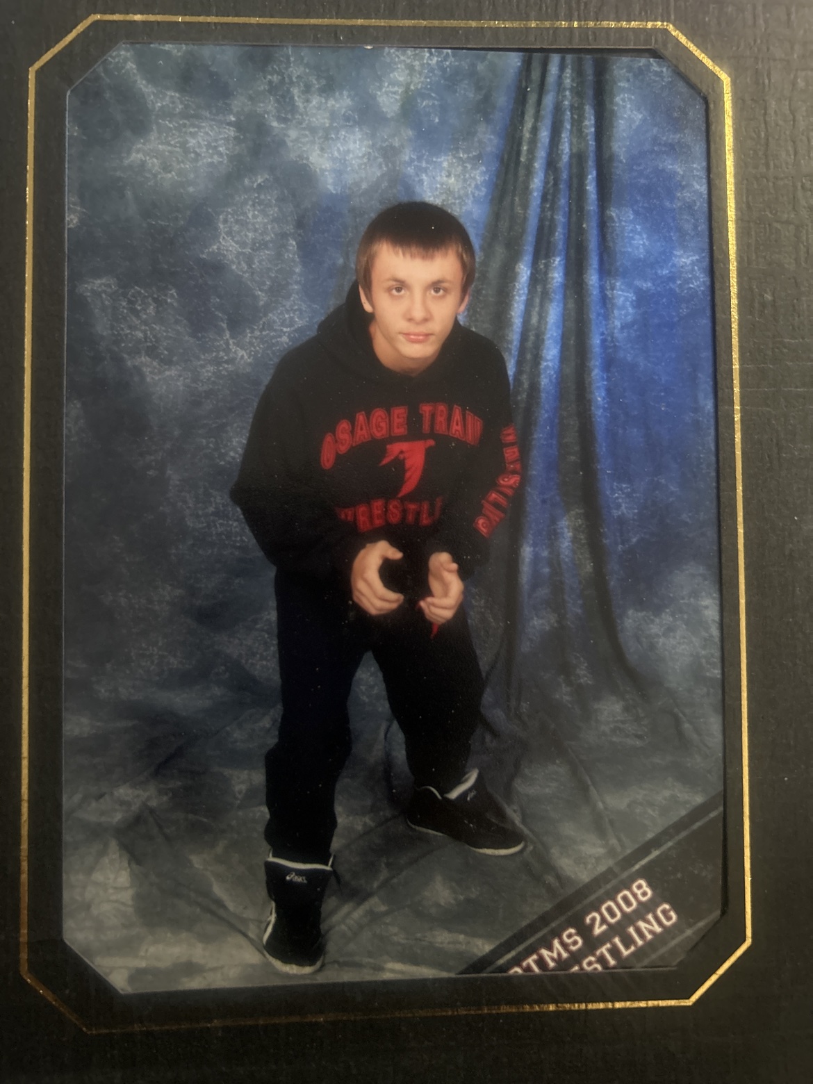 Casey in his wrestling hoodie